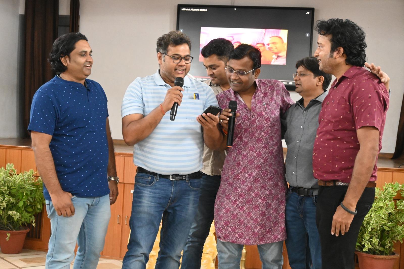 A grid of alumni joining a video call from around the world